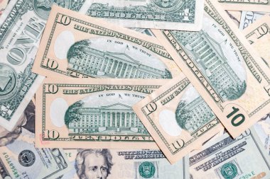 Yakın plan bir sürü Amerikan doları banknotları başkanı. Kavram sıçraması