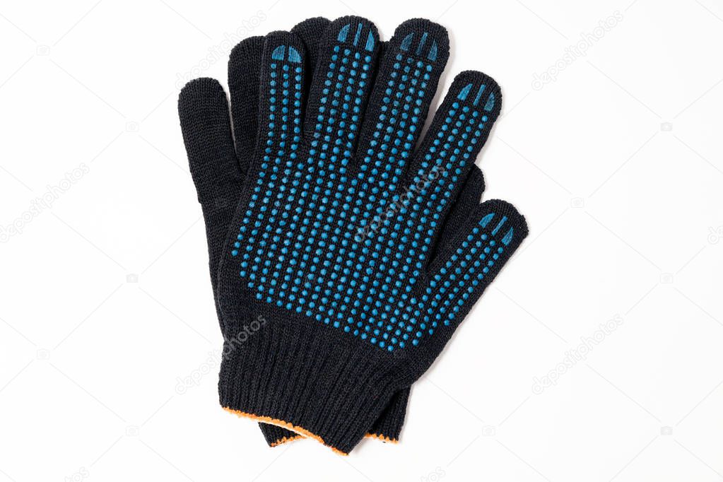 Closeup pair of black textile knitted gloves with professional b