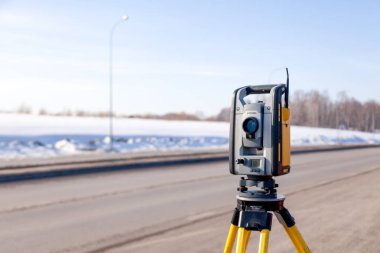 Russia Kemerovo 2019-03-15. Land surveyor equipment. Robotic tot clipart
