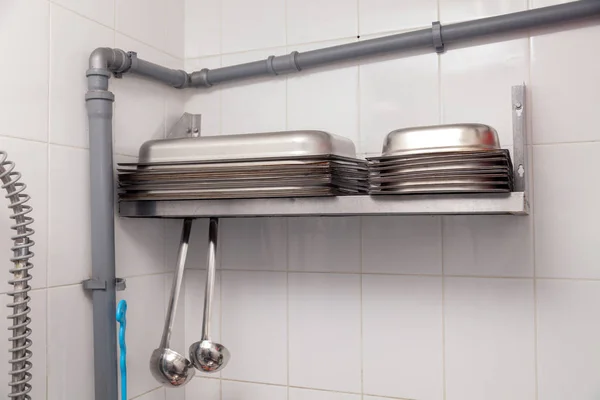 Closeup stack of metal containers for gastronomy — Stock Photo, Image