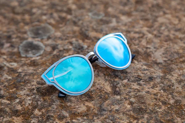 Closeup beautiful blue green mirrored sunglasses ultraviolet on