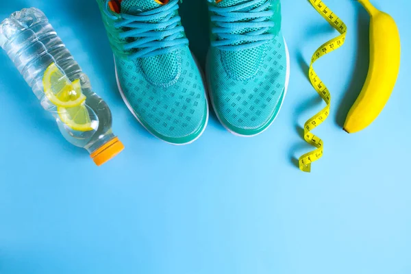 Concept of a sport life. Losing weight. Detox. Detox drink. Sneakers. Copy space. Top view