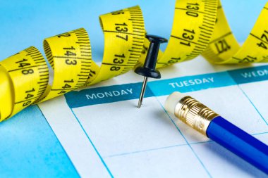 Motivasyon kavramı. Bir diyet planlama, spor, kendini geliştirme, sağlık ve başarı yarın için çalışıyor. Yarın ve Pazartesi kavramı. 