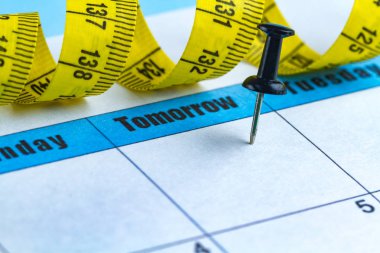 Motivasyon kavramı. Bir diyet planlama, spor, kendini geliştirme, sağlık ve başarı yarın için çalışıyor. Yarın ve Pazartesi kavramı. 