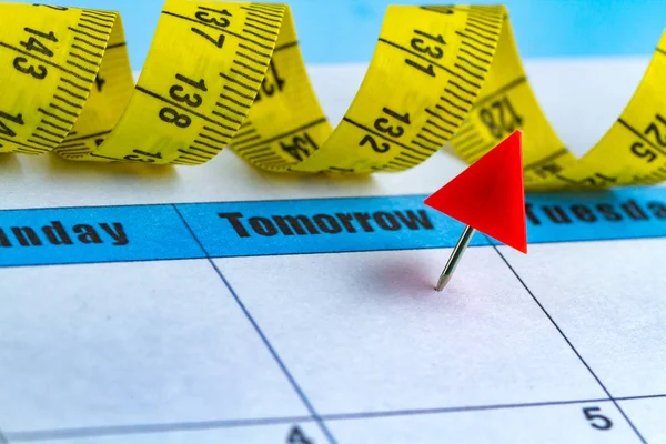 Motivasyon kavramı. Bir diyet planlama, spor, kendini geliştirme, sağlık ve başarı yarın için çalışıyor. Yarın ve Pazartesi kavramı. 