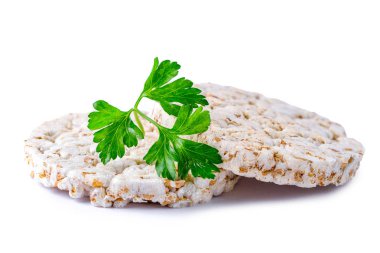 Beyaz bir arka plan üzerinde taze maydanoz ile izole pirinç ekmek. İzole Snack ekmek. 