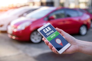 Araba Paylaşım ve Kiralama kavramı. Bir taksi ile mobil uygulama arama müşteri şehirde kısa geziler için bir araba kiralayın. Ekonomi paylaşımı. Taksi online ve paylaşım kavramı