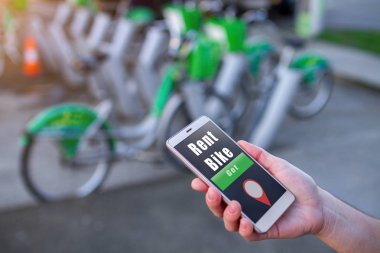 Bisiklet paylaşım. Mobil uygulama tarafından online bir bisiklet kiralayıp. 