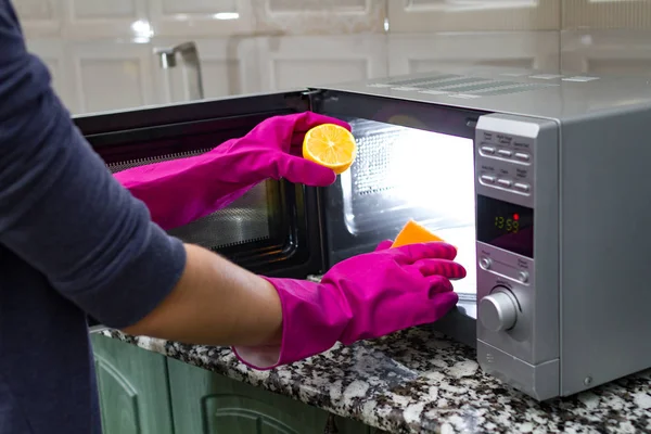 Housewife Hand Rubber Gloves Cleaning Microwave — Stock Photo, Image