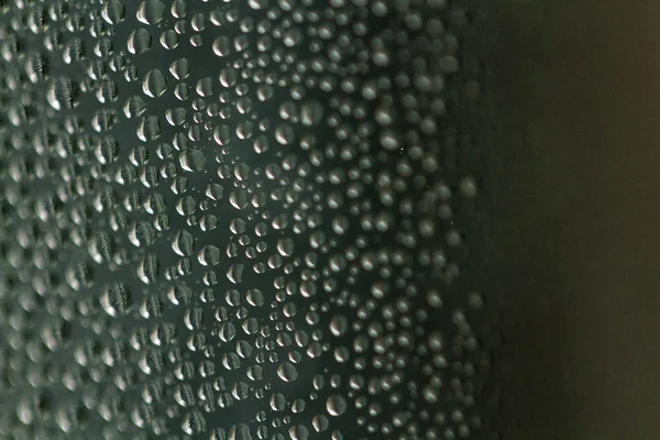 Yağmur damlaları doku. Damla yağmurlu, ıslak, nemli hava sırasında camına