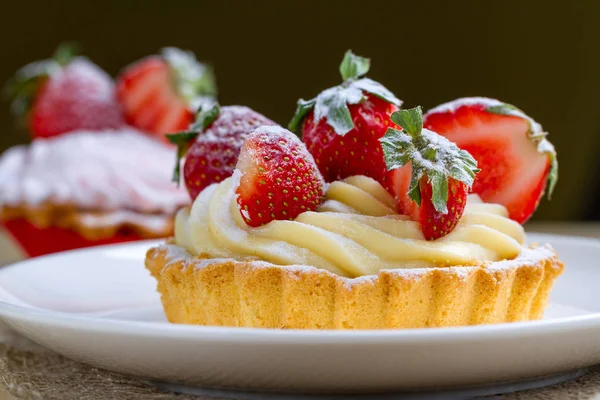 Tasty strawberry cream cake. Pastry. Sweet dessert on a plate