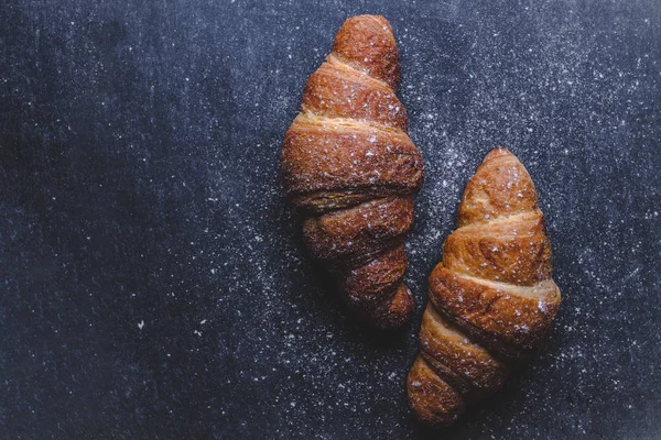 French breakfast with freshly baked croissants. Bakery products. Top view, copy space