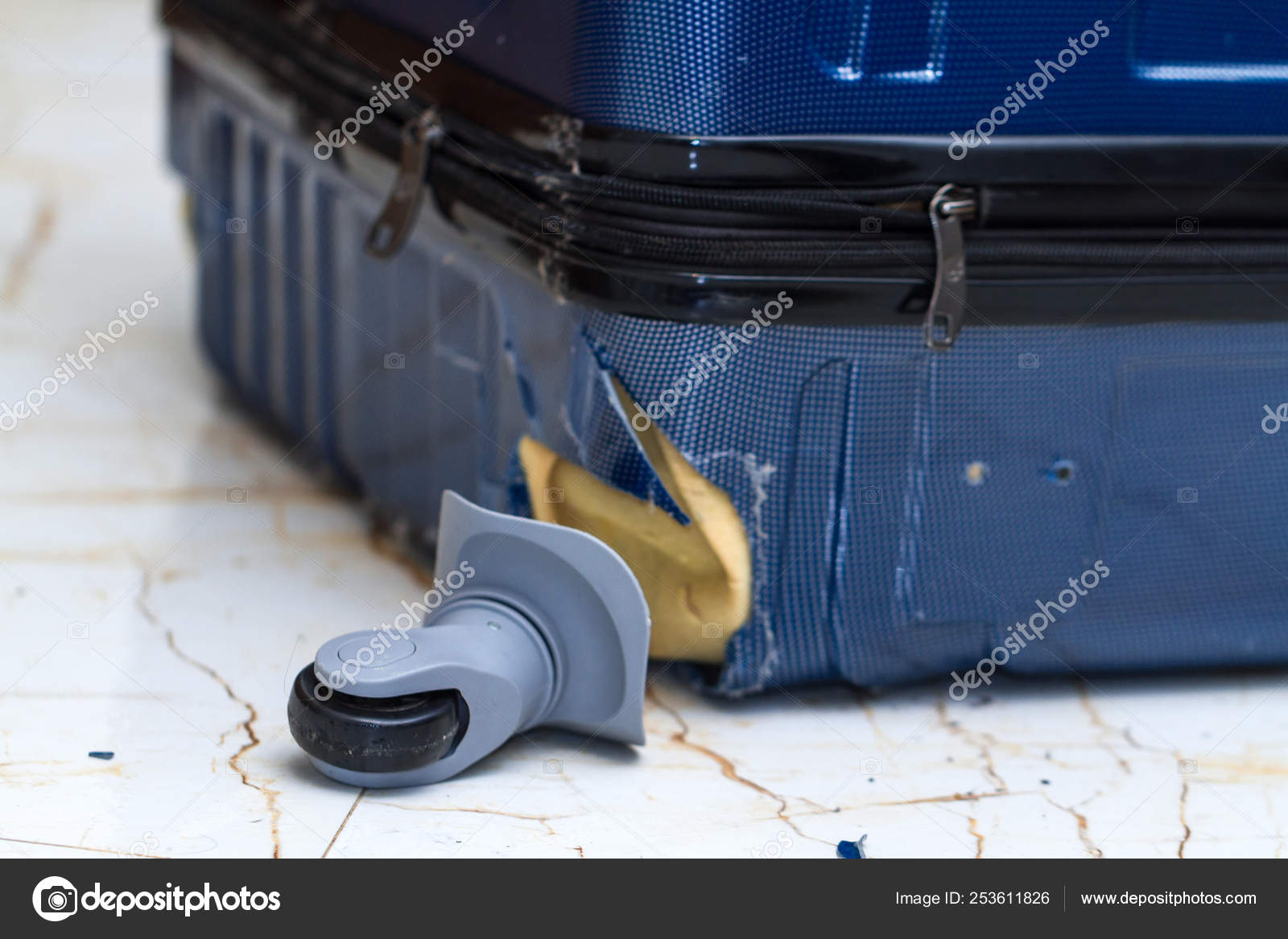 broken luggage wheel