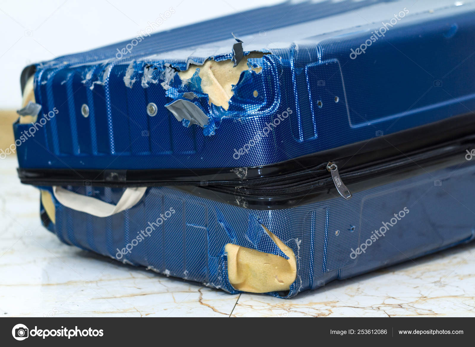 broken luggage wheel