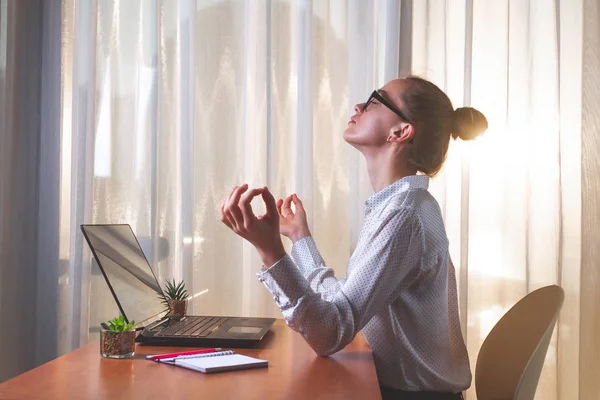 stock image Young business woman feeling fatigue and relaxing after a difficult, hard work on the project. Need for rest during sedentary work