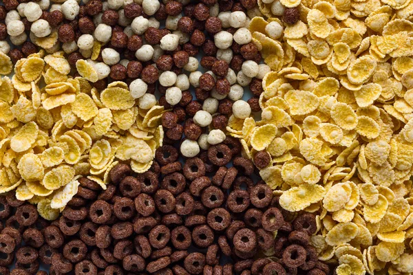 Textura y fondo de seco, chocolate, bolas, anillos y yello — Foto de Stock