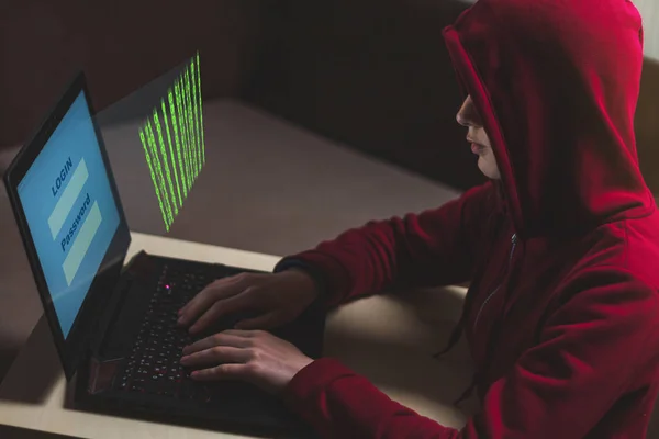 Dangerous hooded woman hacker breaks into personal data and infe