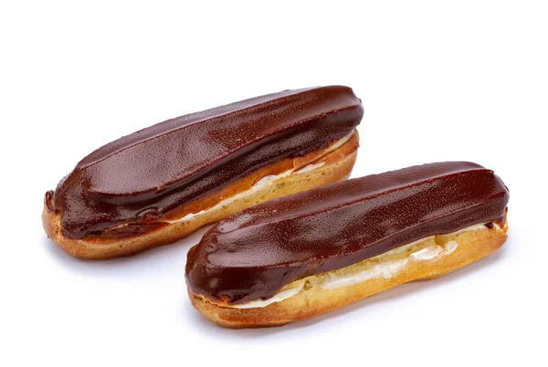 Traditioneel Frans dessert. Geïsoleerde twee eclairs met custard an — Stockfoto