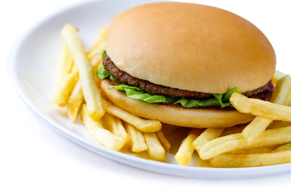 French fries and hamburger on a plate on a white background. Jun