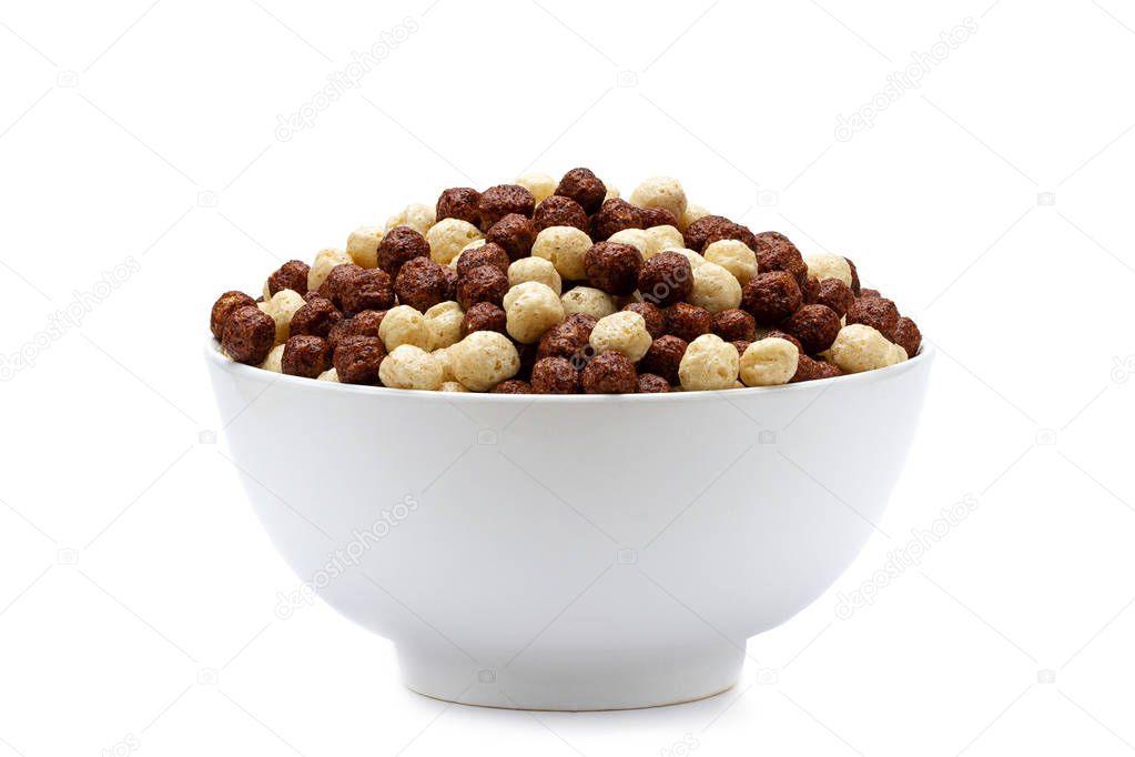 Isolated bowl of chocolate corn brown and white balls on a white