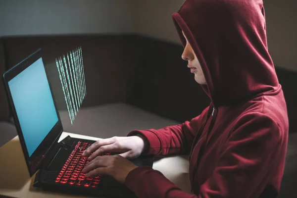 Dangerous hooded woman hacker breaks into personal data and infe — Stock Photo, Image