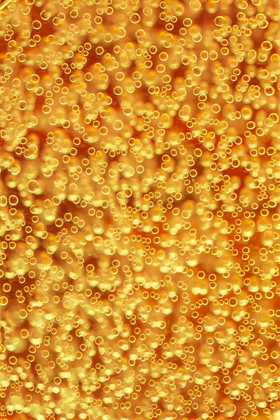 Hochdetaillierte Textur Gasförmiger Flüssigkeit Mit Glitzernden Gelben Blasen — Stockfoto