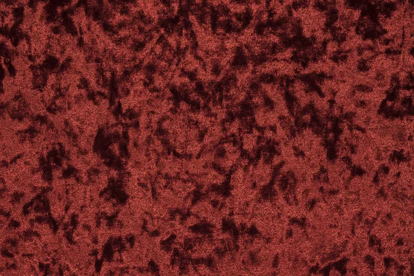 Highly detailed texture of red velour cloth.