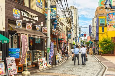 yokosuka, japan - july 19 2020: Dobuita entertainment district near Yokosuka naval base called Dobuita-dori shopping street famous among the sailors for its American style Burger fast food restaurants clipart