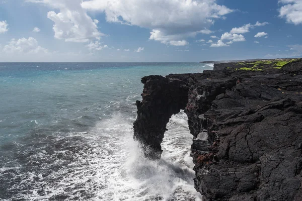 Holei Sea Arch in Hawaii Volcanoes National Park in Hawaii, United States Stock Photo