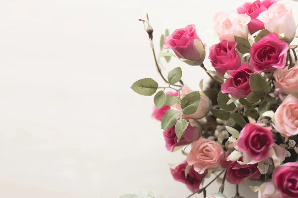 Flowers are in a wooden vase. Placed near the glass window on th — Stock Photo, Image