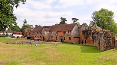 KENILWORTH, AUGUST 06: View of the ruins of Kenilworth Castle with a well-preserved stable on a sunny day, UK 2018. clipart