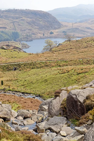 View of the valley from a flowing stream on the Cwmorthin Waterfall trail in the mountains of Snowdonia National Park, Wales. — Stock Photo, Image