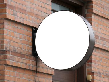 Kopenhag 'ın tuğla duvarında boş yuvarlak tabela