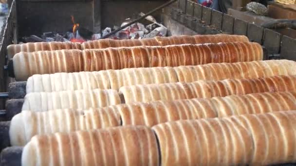 Preparing Traditional Czech Street Food Trdelnik Rolled Wooden Skewers Hot — Stock Video