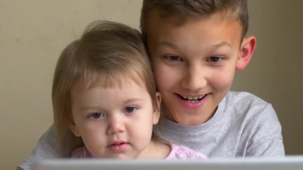 Two Children Watch Video Laptop Have Fun Together Home Big — Stock Video