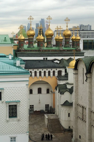this photo was taken in Russia, inside the Kremlin. You can see old and new buildings in a superposition