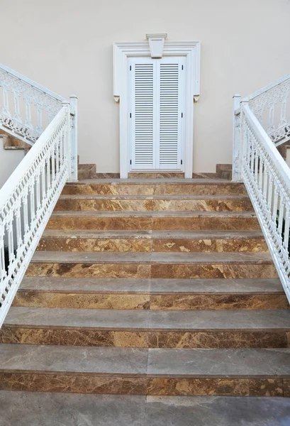 Front door, front view of a white door with white exterior Stock Photo