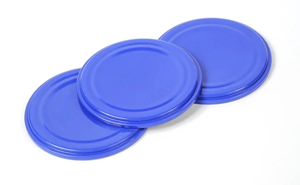 Screw caps for glass jars. For canning, canned food. Blue caps on white background — Stock Photo, Image