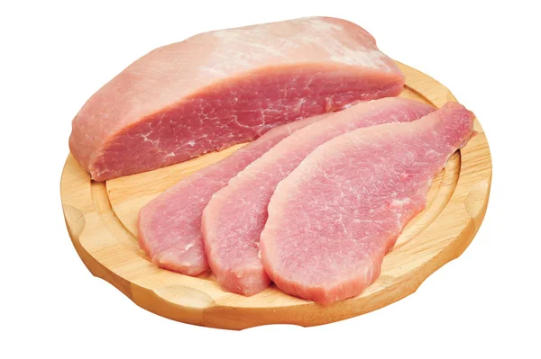 Carne crua de porco cortada numa tábua, num fundo branco isolado — Fotografia de Stock