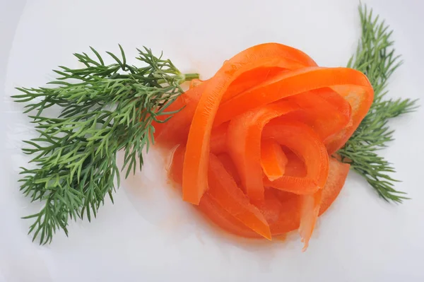 Decorated on the white plate flower-cut tomato and dill — Stock Photo, Image