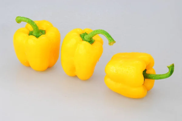 Yellow pepper isolated on a gray background — 스톡 사진