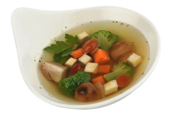 Gemüsesuppe mit Blumenkohl, Kartoffeln, Erbsen, Karotten und Petersilie auf weißem Hintergrund — Stockfoto