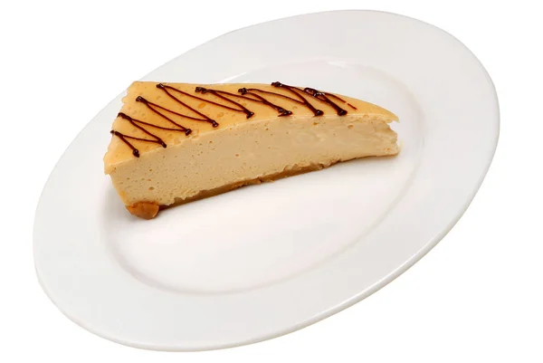Delicioso pastel de queso. Rebanada de delicioso pastel de coco en un plato sobre fondo blanco aislado — Foto de Stock