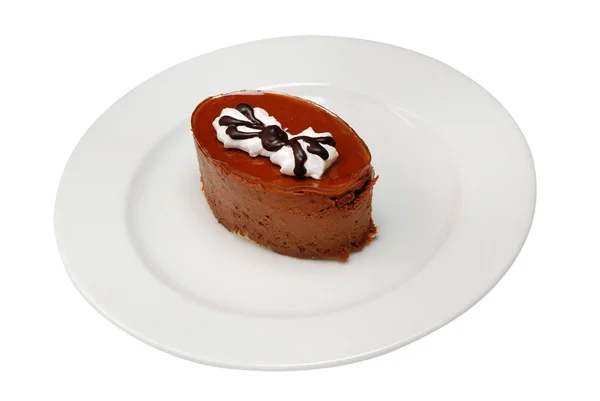 Pedaço de delicioso cheesecake em um fundo isolado branco — Fotografia de Stock