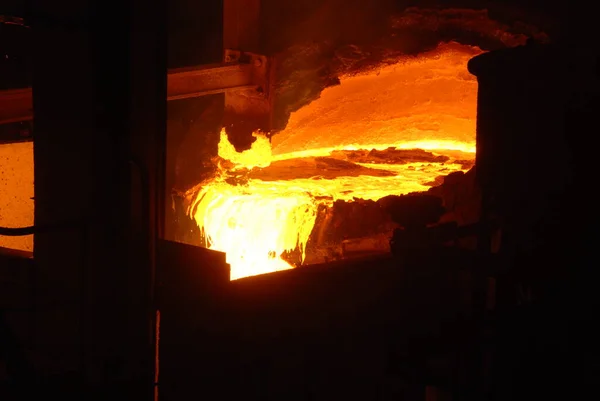 Very rare close view of working open hearth furnace at the metallurgical plant. Molten hot steel — Stock Photo, Image
