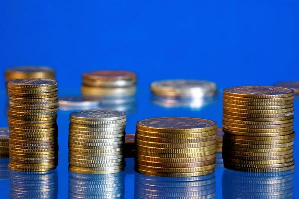 Stacks of metal coins accountant, financial and economic product. Coin-a money sign made of metal by coinage are in the form of a correct circle.