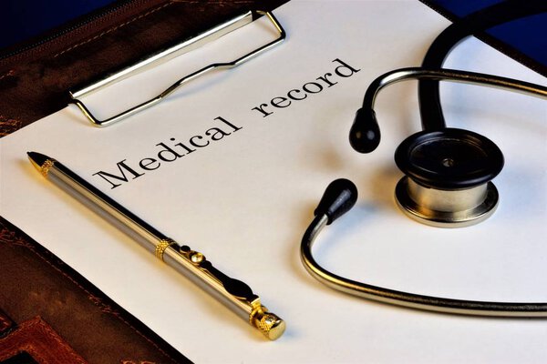 Medical records and stethoscope. Medicine  the science that studies the disease, preventing and leading them to a successful outcome.  Doctors treat disorders of body parts with the help of hygiene products and prescribing drugs inside and outside o