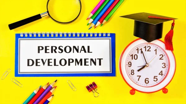 Personal development-writing text on a business and education planning Notepad. Long-term vision of future actions, development of methods for achieving the Goal.