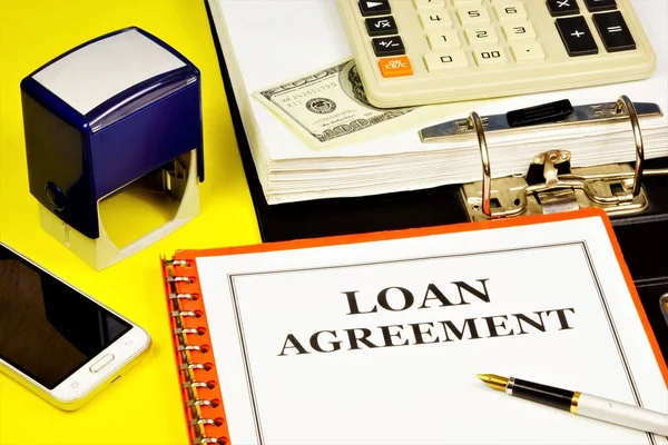 Loan agreement - the inscription of the text in the document folder planning. Provision of funds to the borrower under the terms of the agreement.