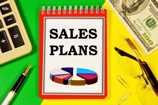Sales plan-an inscription on a Notepad. Long-term vision of future actions, development of a method for achieving the goal of a stable long-term competitive advantage.